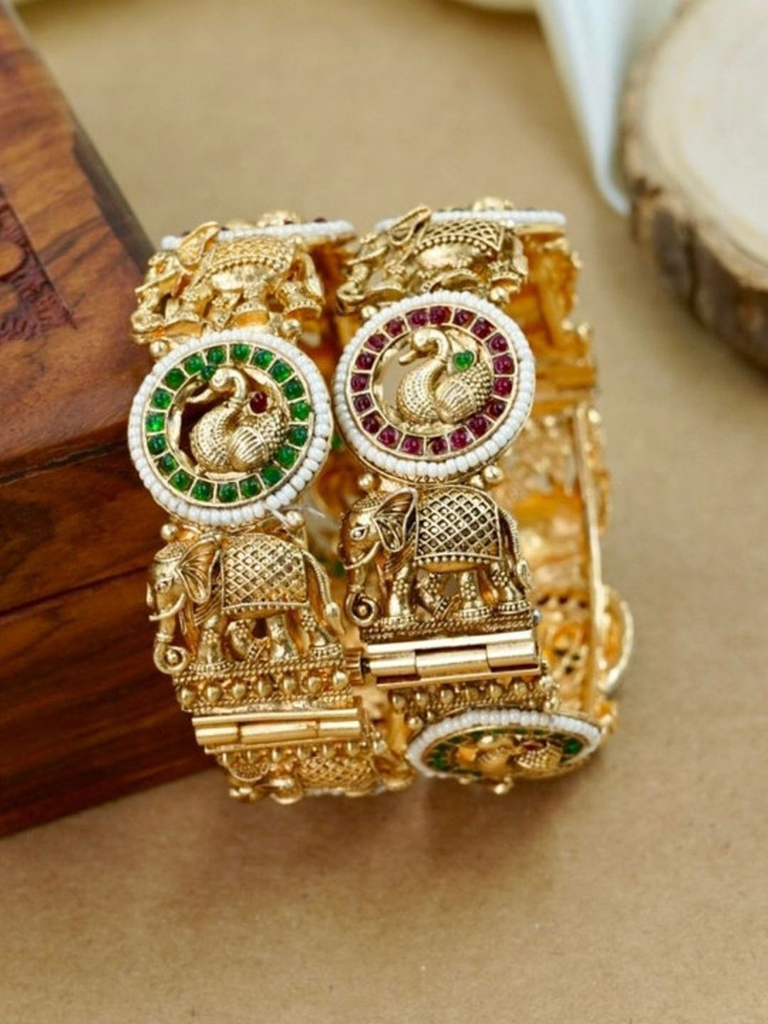 Ishhaara Antique Gold Peacock Bangle - a beautifully crafted gold bangle with peacock motifs and colorful stones - view 3