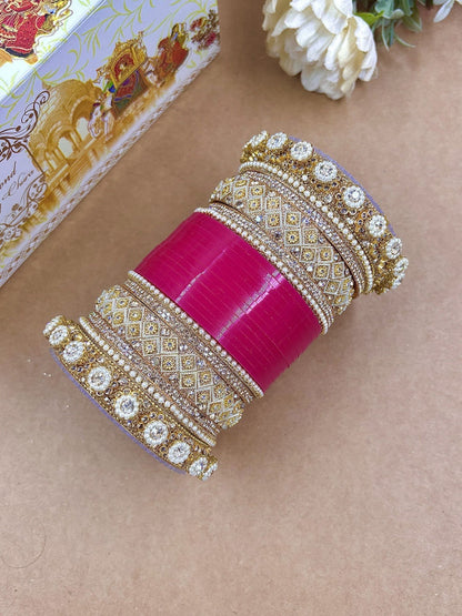 Ishhaara Embellished Pink Kundan Bangles Set - a stack of pink and gold bangles with rhinestone embellishments