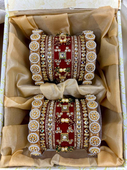 Ishhaara Embellished Red Bangle Set - a pair of intricately designed red and gold bangles with Kundan stones and pearls