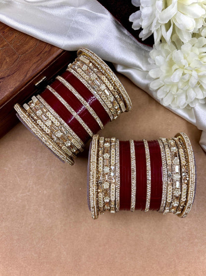 Ishhaara Embellished Red Kundan Bangles Set - a stack of red and gold bangles with diamond-cut stones - view 3