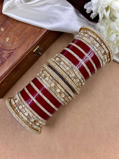Ishhaara Embellished Red Kundan Bangles Set - a stack of red and gold bangles with diamond-cut stones - view 5
