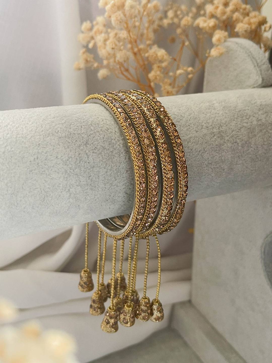 Ishhaara Gold Antique Gold Stone Bangles With Latkan