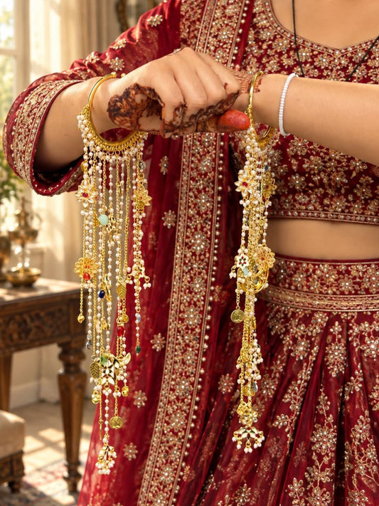 Ishhaara Gold Finish Pearl And Hanging Charm Kaleera