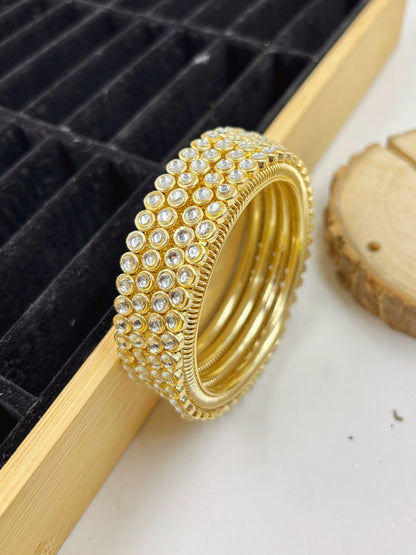 Ishhaara Gold Kundan Bangle Set - Elegant gold bangles with Kundan stones