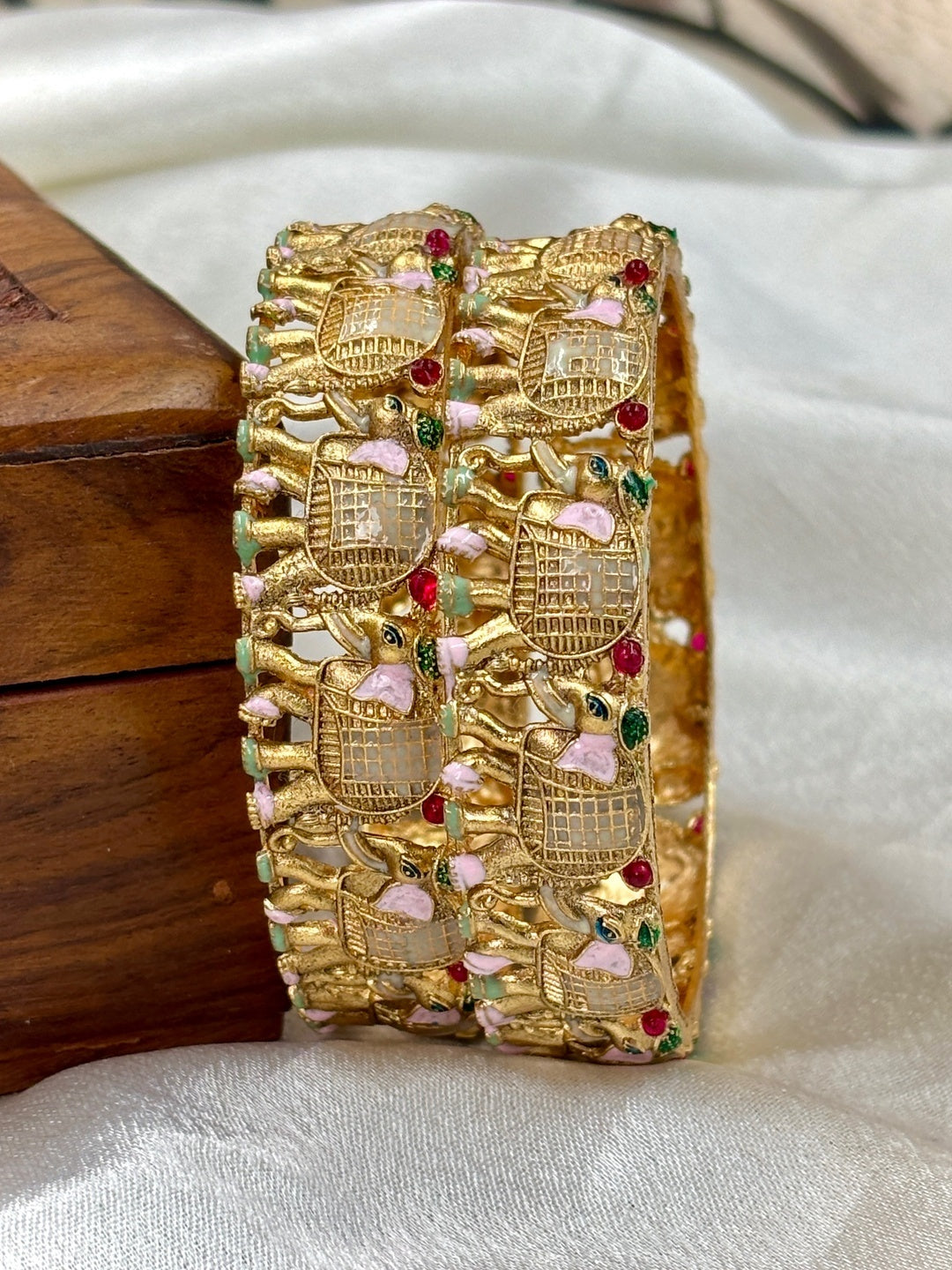 Ishhaara Gold Kundan Bangle with Bird Motif - a stunning piece of jewelry