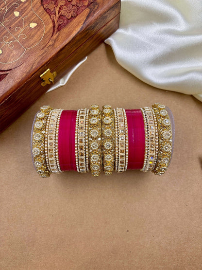 Ishhaara Handcrafted Kundan Bangles Set - a stack of intricately designed bangles with red glass center - view 4
