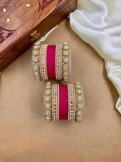 Ishhaara Handcrafted Kundan Bangles Set - a stack of intricately designed bangles with red glass center - view 5