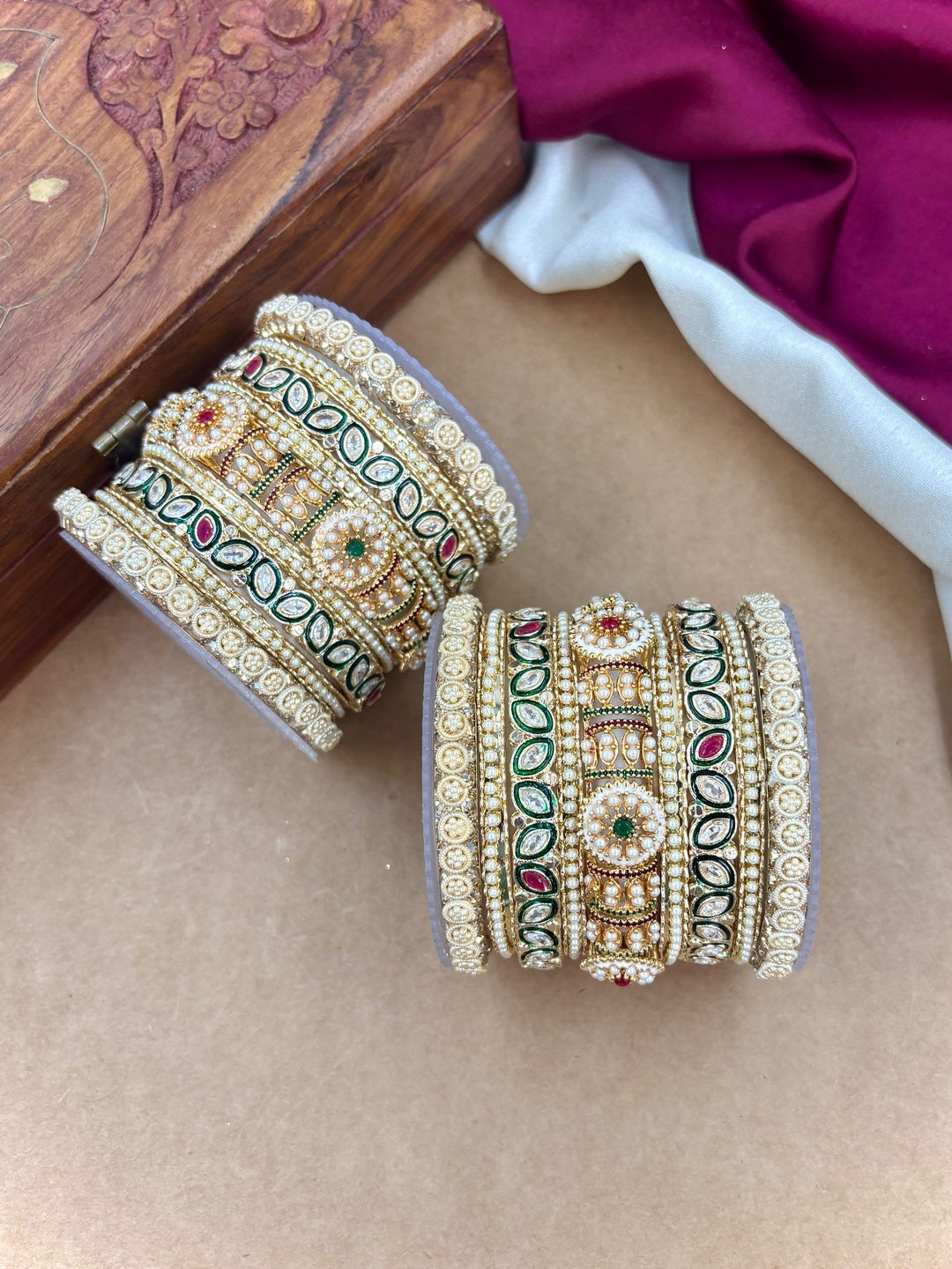 Ishhaara Handcrafted Kundan Bangles Set for Women - a woman wearing green saree with kundan bangles - view 3