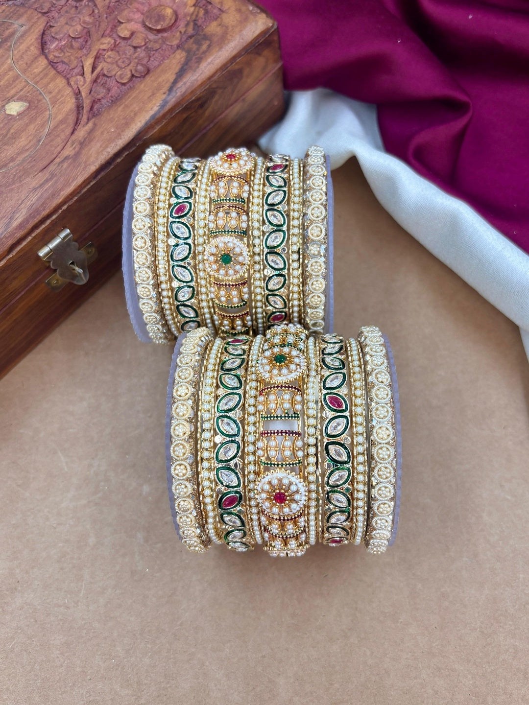 Ishhaara Handcrafted Kundan Bangles Set for Women - a woman wearing green saree with kundan bangles - view 4
