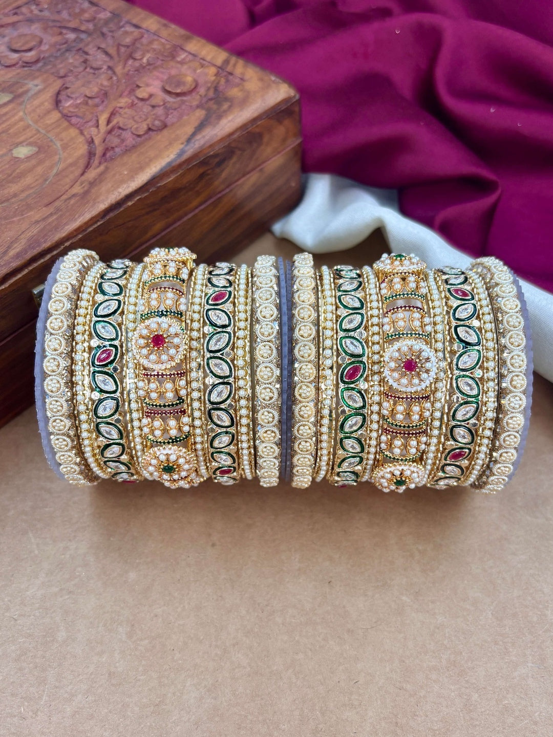 Ishhaara Handcrafted Kundan Bangles Set for Women - a woman wearing green saree with kundan bangles - view 5