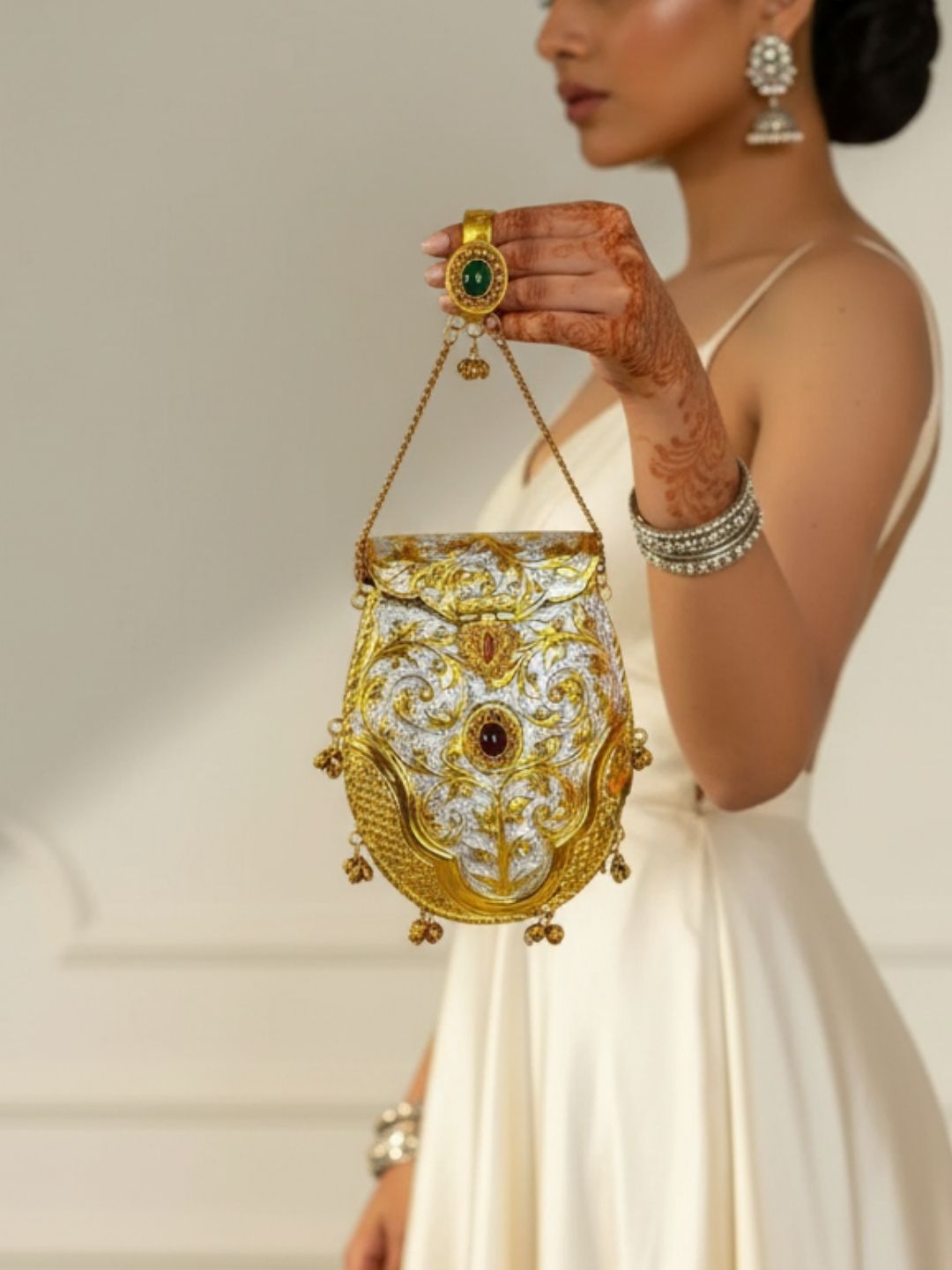 Ishhaara Kundan And Meenakari Brass Handcarved Clutch