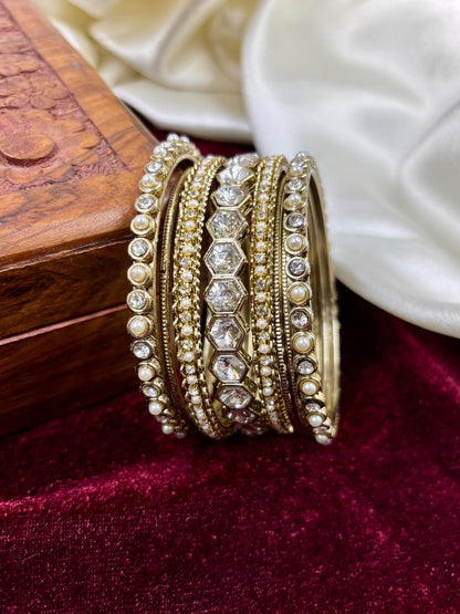 Ishhaara Kundan Bangle Set - a stack of intricately designed gold bangles with precious stones and pearls - view 5