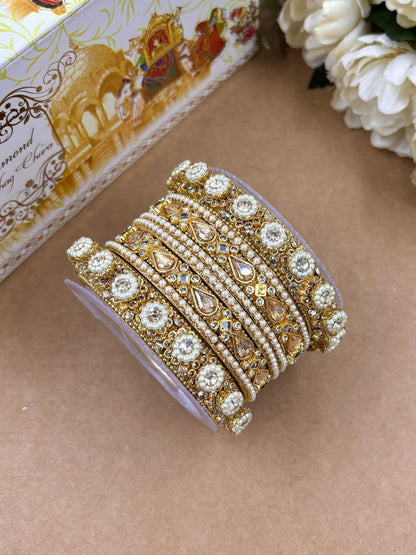 Ishhaara Kundan Bangles Set - a beautifully crafted set of gold-plated bangles adorned with intricate Kundan work and sparkling stones - view 2