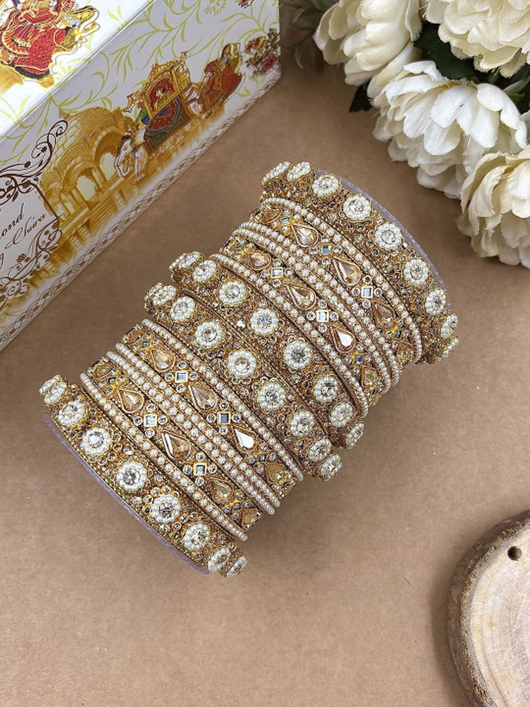 Ishhaara Kundan Bangles Set - a beautifully crafted set of gold-plated bangles adorned with intricate Kundan work and sparkling stones - view 4