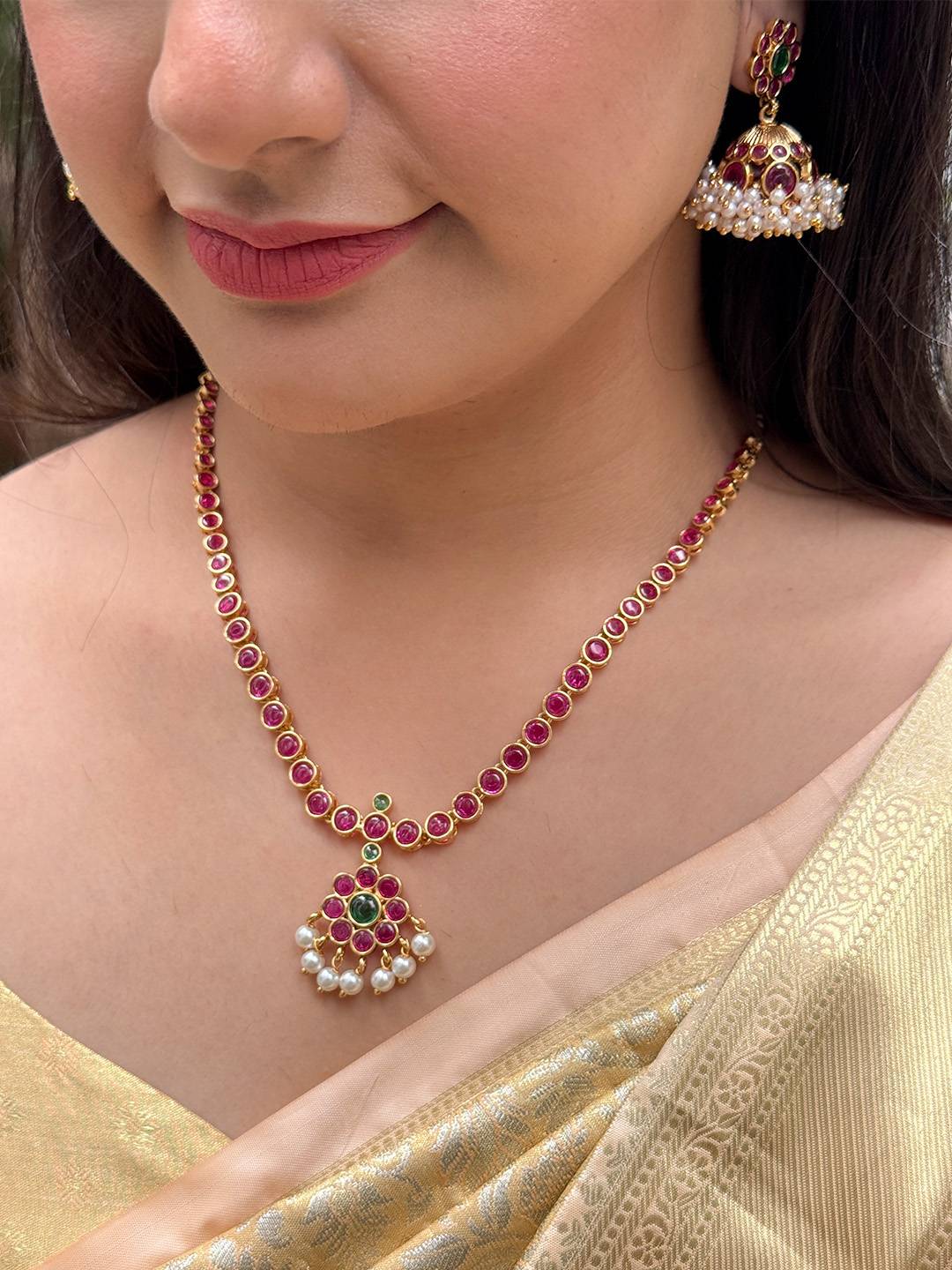 Ishhaara Matte Finish Red Colored Kemp Pearl Flower Necklace Set