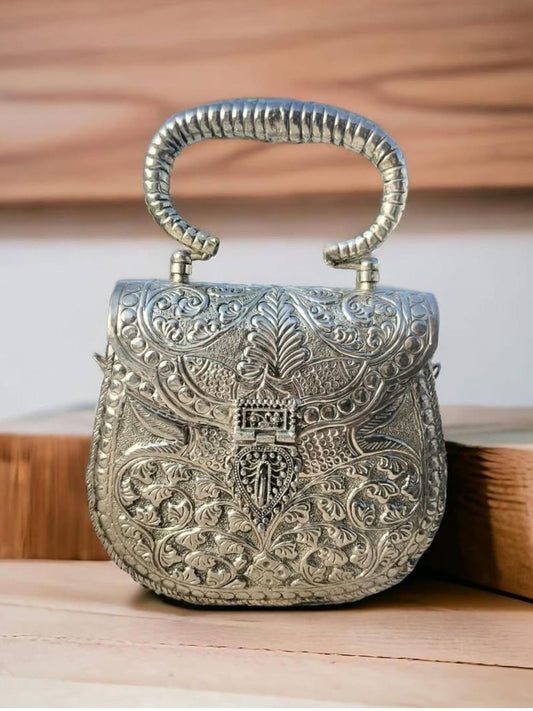 Ishhaara Meena Work Metal Handcrafted Silver Clutch