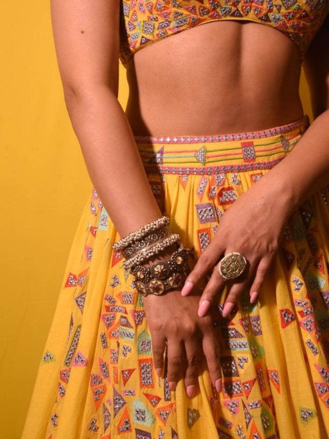Ishhaara Pranutan Bahl In Oxidised Tribal Bangle With Red Stones