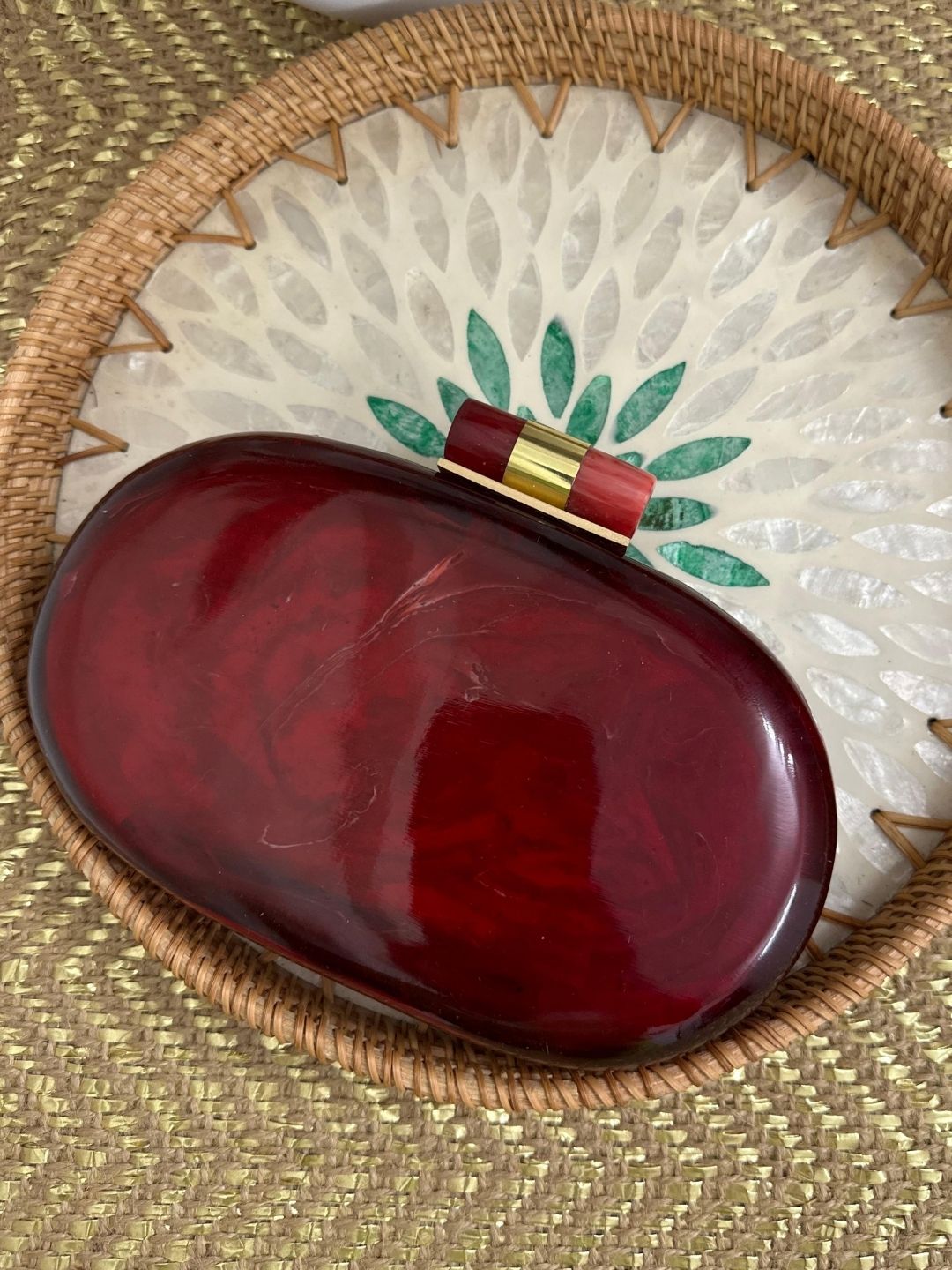 Ishhaara Red Capsule Resin Clutch Bag