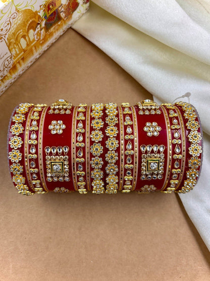 Ishhaara Red Kundan Bangles - A pair of intricately designed red kundan bangles with gold and stone embellishments - view 2