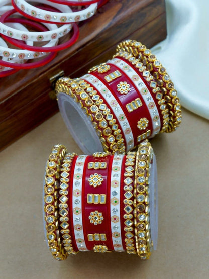 Ishhaara Traditional Red Kundan Bangle Set - a close-up view of intricately designed red and white bangles with gold and stone embellishments